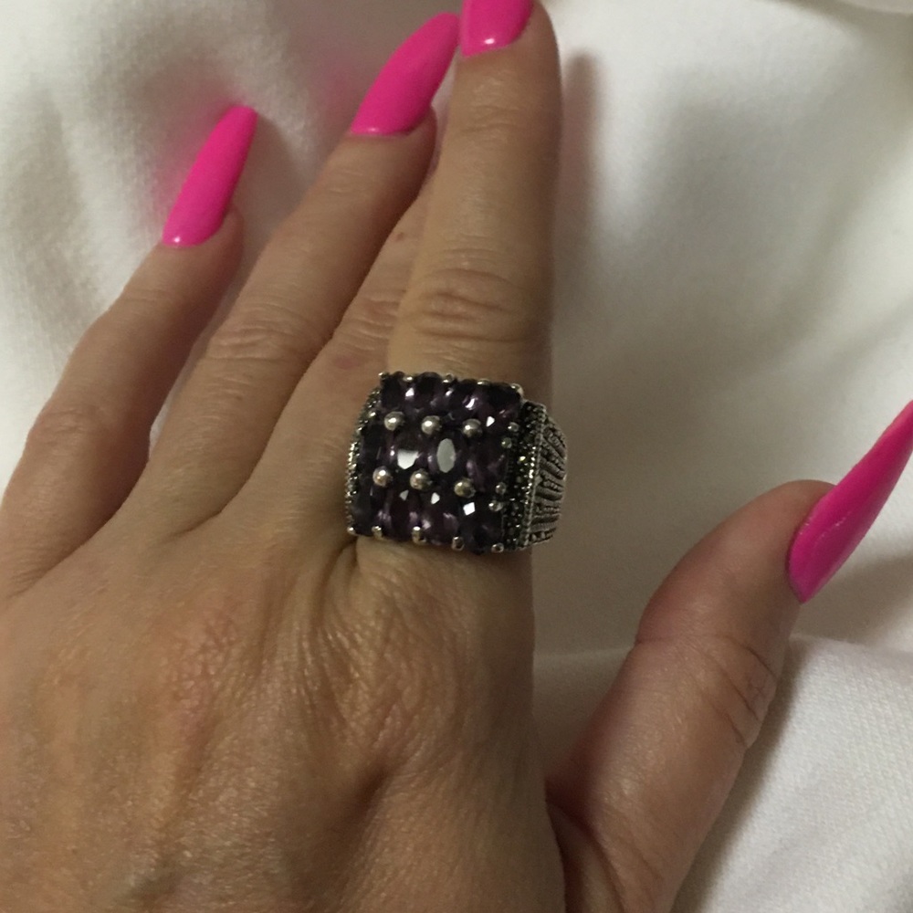 Sterling silver ring with 12 purple stones
